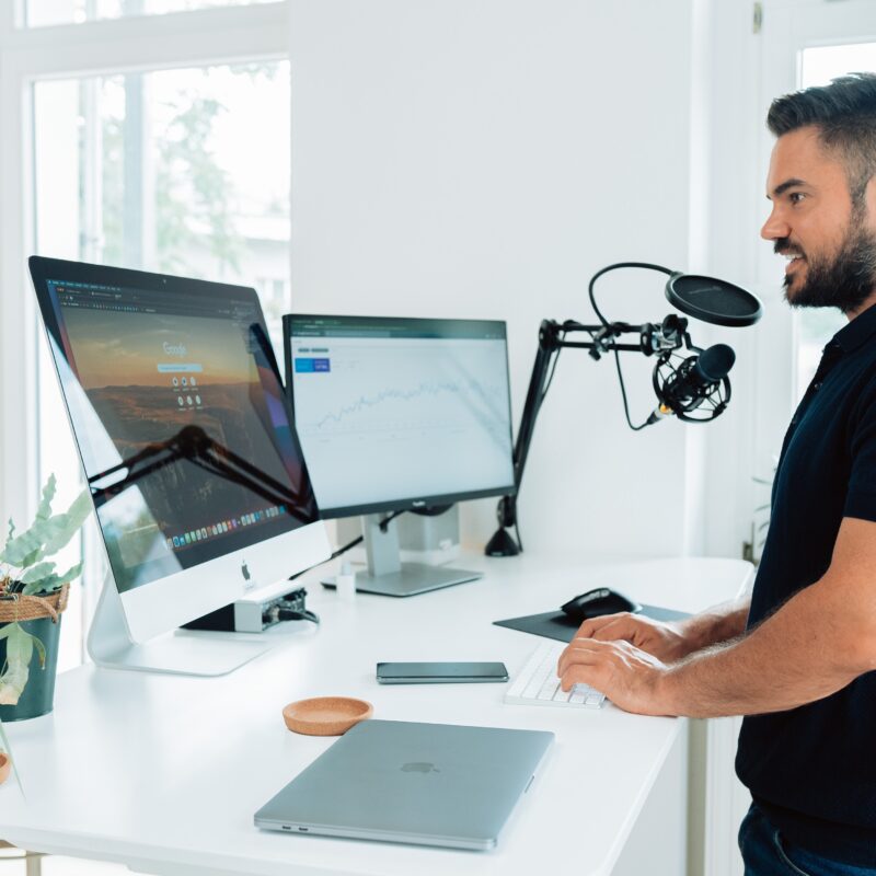 Picture of a man podcasting