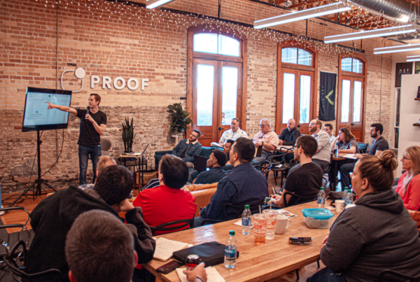Picture of a man speaking in front of a group