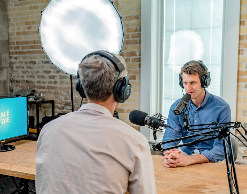 image of men on podcast