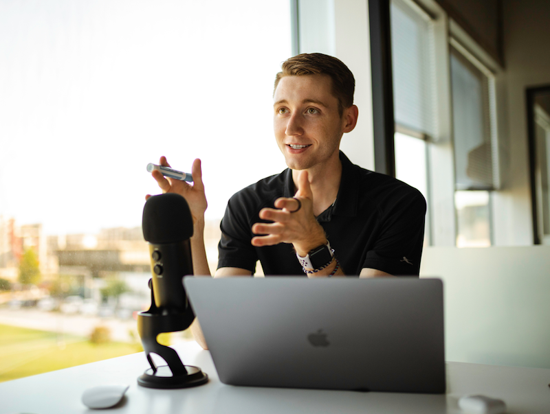 Picture of a man doing a podcast